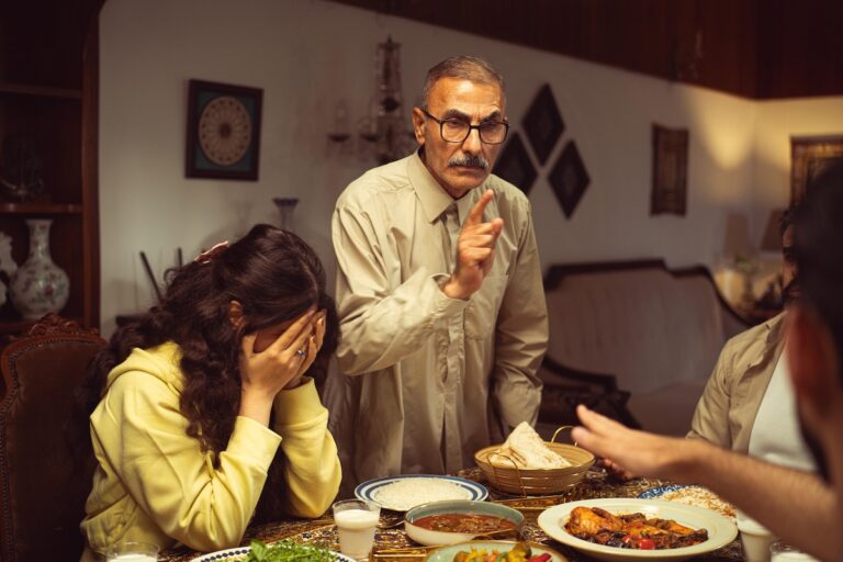 Betrayal in family relationships depicted through conflict among adult family members